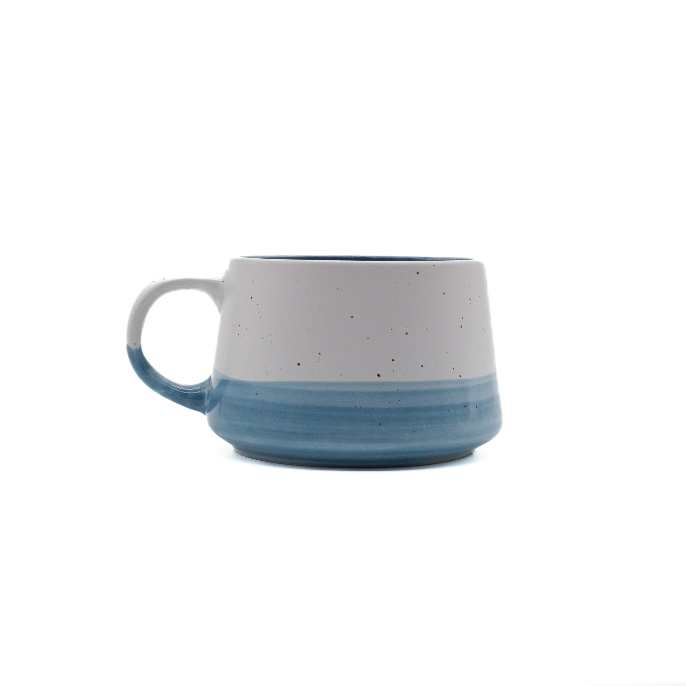 Speckled ceramic mug with blue accent on a white background