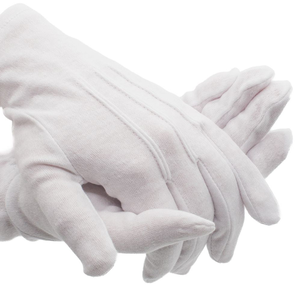 White gloved hands on a white background. 