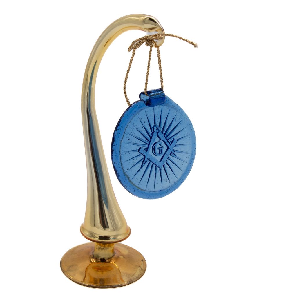 Decorative blue suncatcher featuring a Square and Compass on gold curved stand with a white background