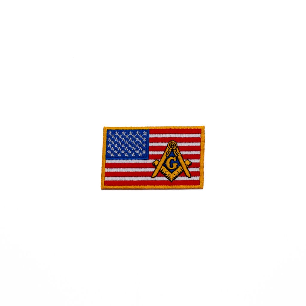 American flag patch with Masonic Square and Compasses on a white background.