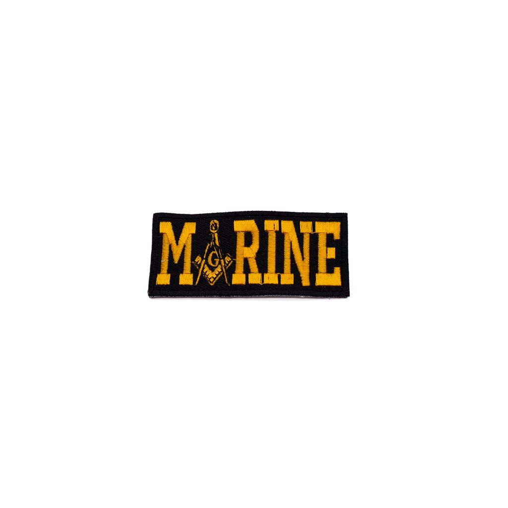 Marine Corps patch with 'MARINE' text and Square and Compasses on a white background.