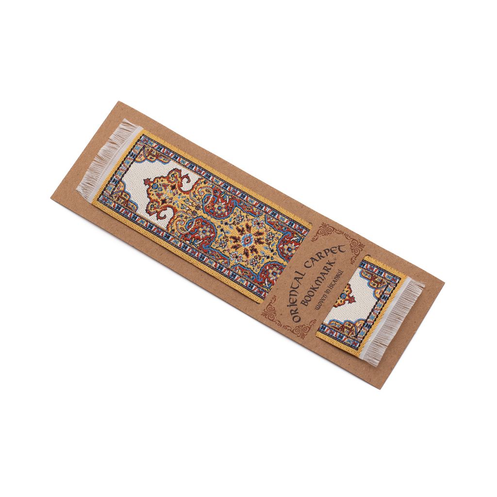 A decorative, yellow rug bookmark with intricate patterns on a white background