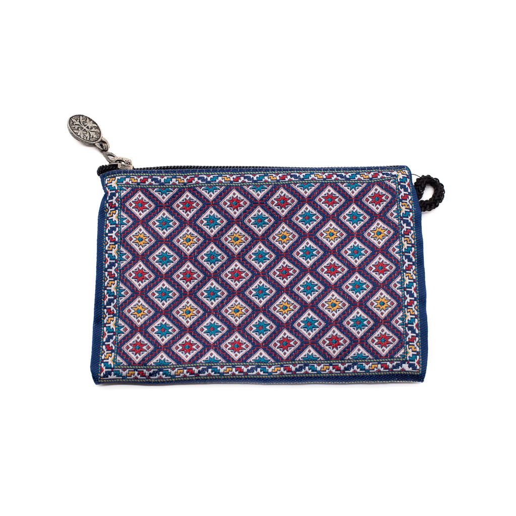 Patterned blue, white, yellow and red pouch with a zipper on a white background