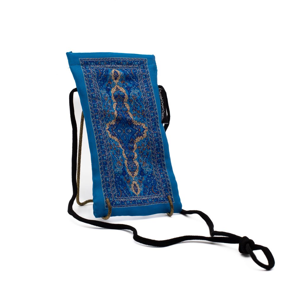 Blue patterned pouch with a decorative design on a white background