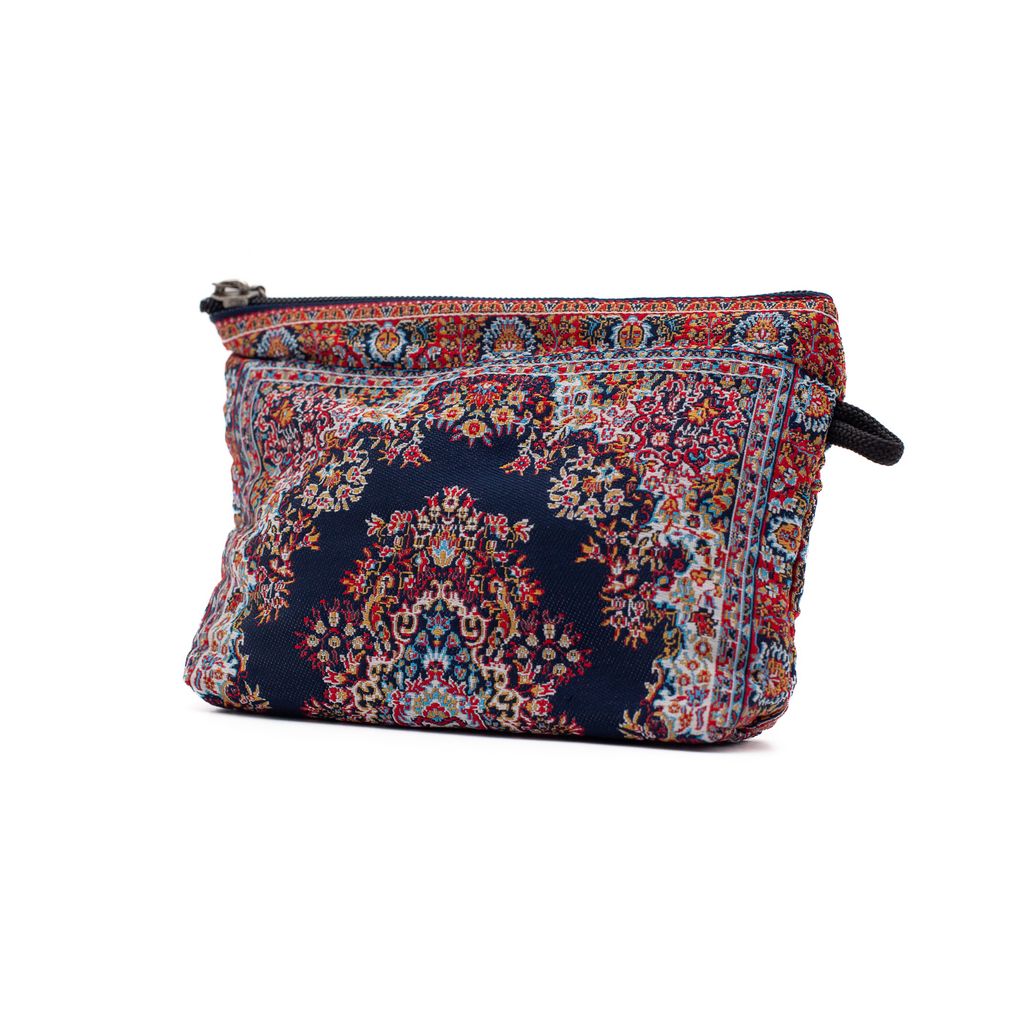 Multicolored patterned navy pouch on a white background