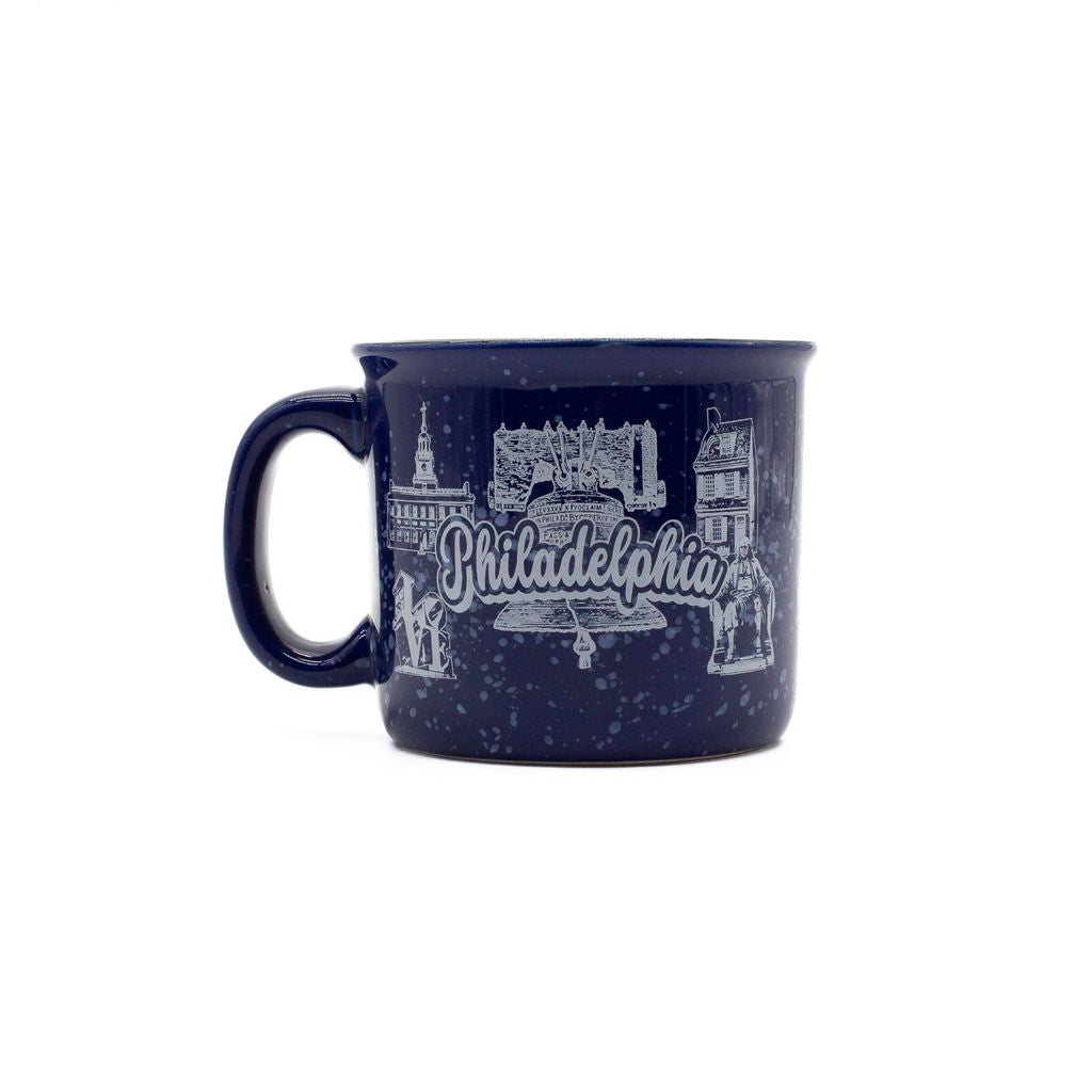 Navy blue mug with white Philadelphia-themed design on a white background