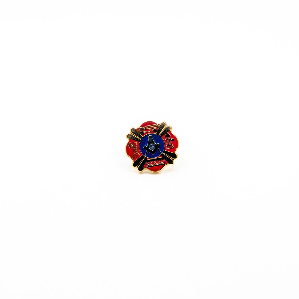 Metallic pin with square and compass in the center, firefighter themed designs on four sides on a white background