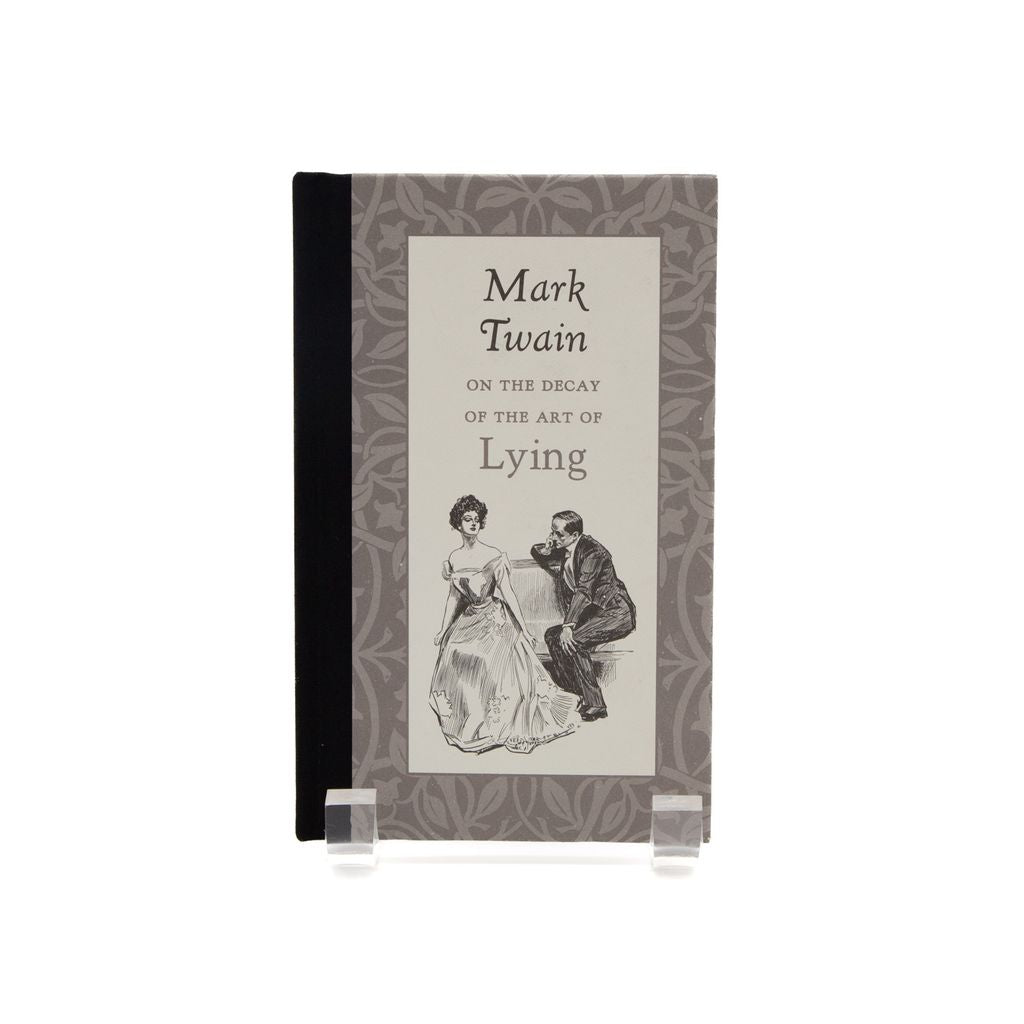 Book titled 'On the Decay of the Art of Lying' by Mark Twain with a decorative cover featuring man and woman dressed in formal clothing on a white background