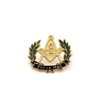 Gold, green and black lapel pin with Square and Compass surrounded by wreath and banner design, text reads 'Prince Hall' 