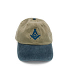 Two-tone blue and green cap with a blue Square and Compass on a white background