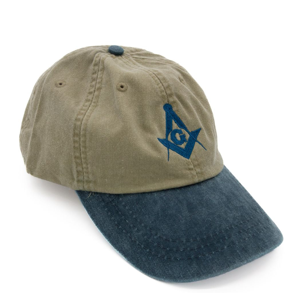 Two-toned green and blue cap with a blue Square and Compass on a white background