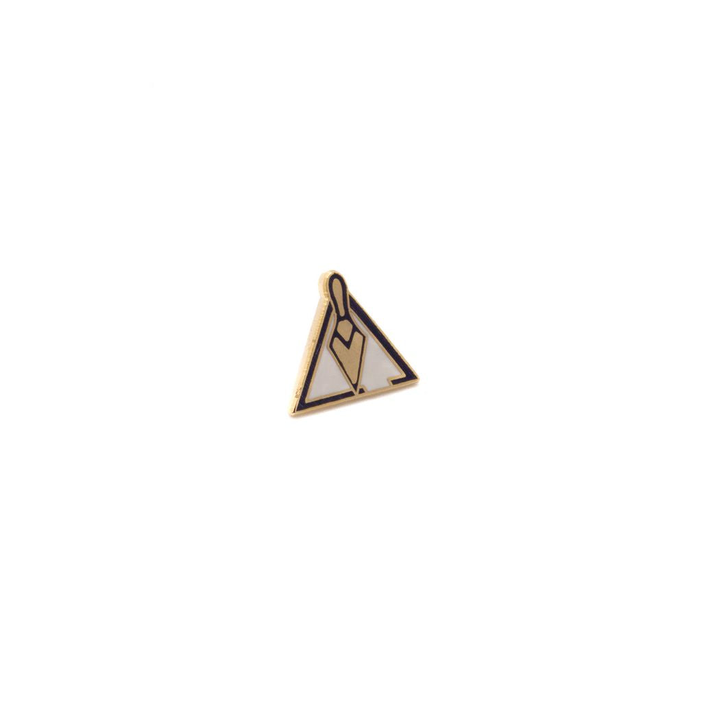 Triangle-shaped lapel pin with a gold trowel design on a white background
