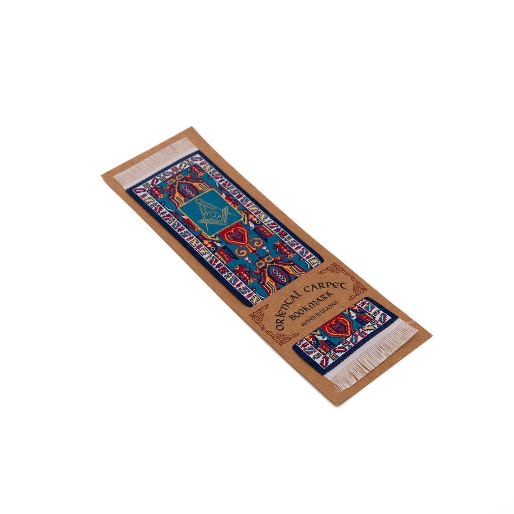 Decorative bookmark with geometric patterns and square and compass on a cardboard backing