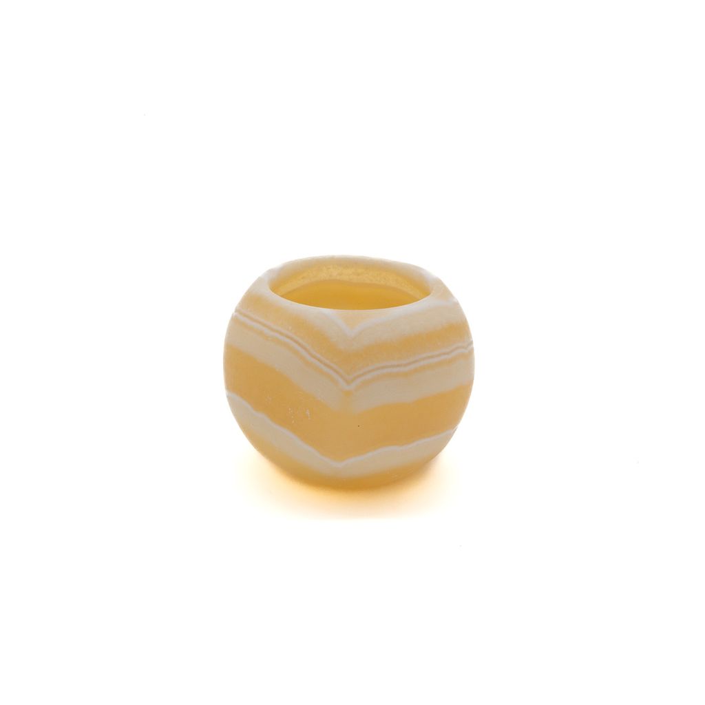 Small tan and white swirled ceramic vase on a white background