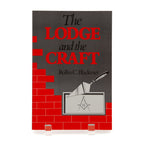 Book cover of 'The Lodge and the Craft' with red brick design and Masonic symbols.