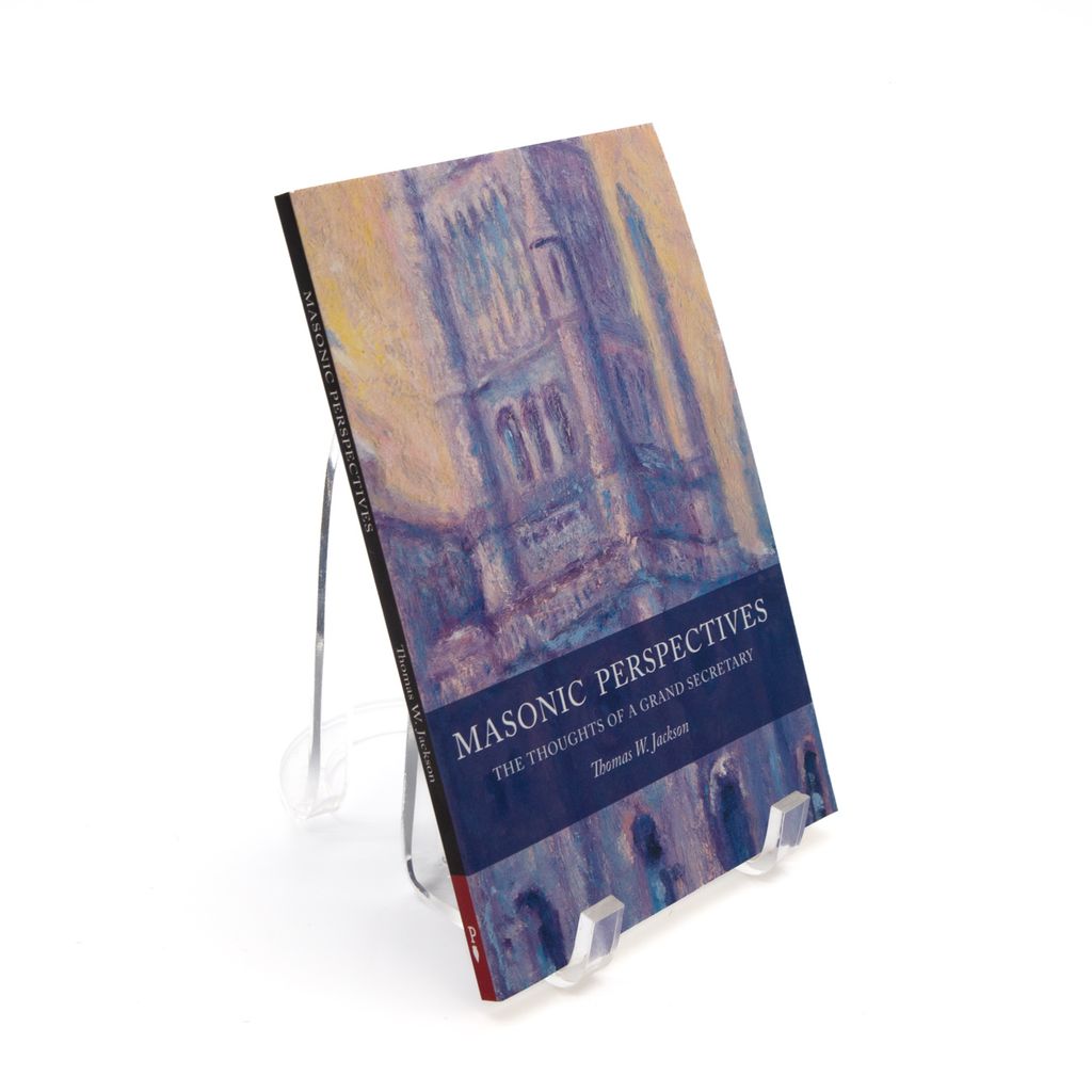 Book titled 'Masonic Perspectives' on a stand with a white background