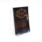 Book cover of 'Doneraile Court' with decorative text and a portrait of woman looking from behind door on a white background