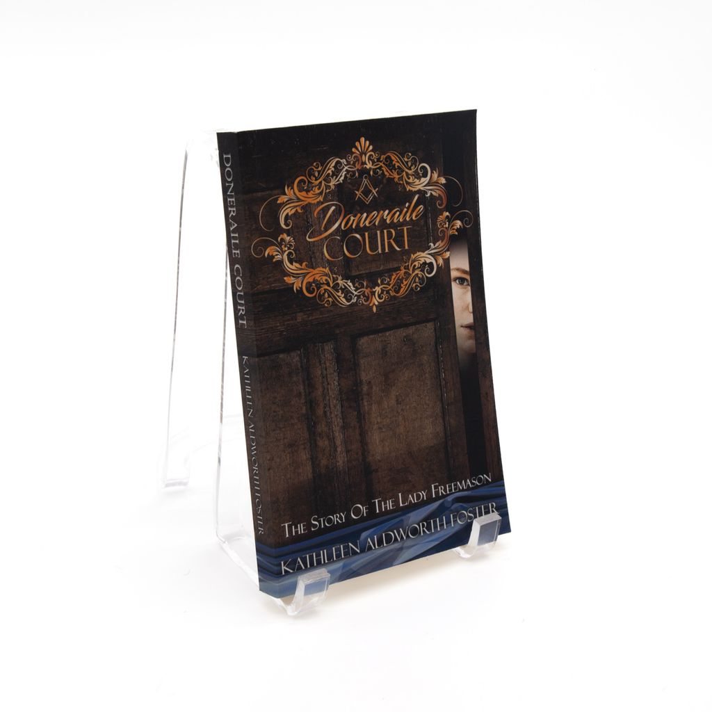 Book cover of 'Doneraile Court' with decorative text and a portrait of woman looking from behind door on a white background