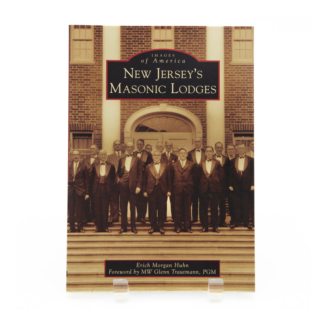 Book cover of 'New Jersey's Masonic Lodges' with a group of men in formal attire in front of a brick building background.