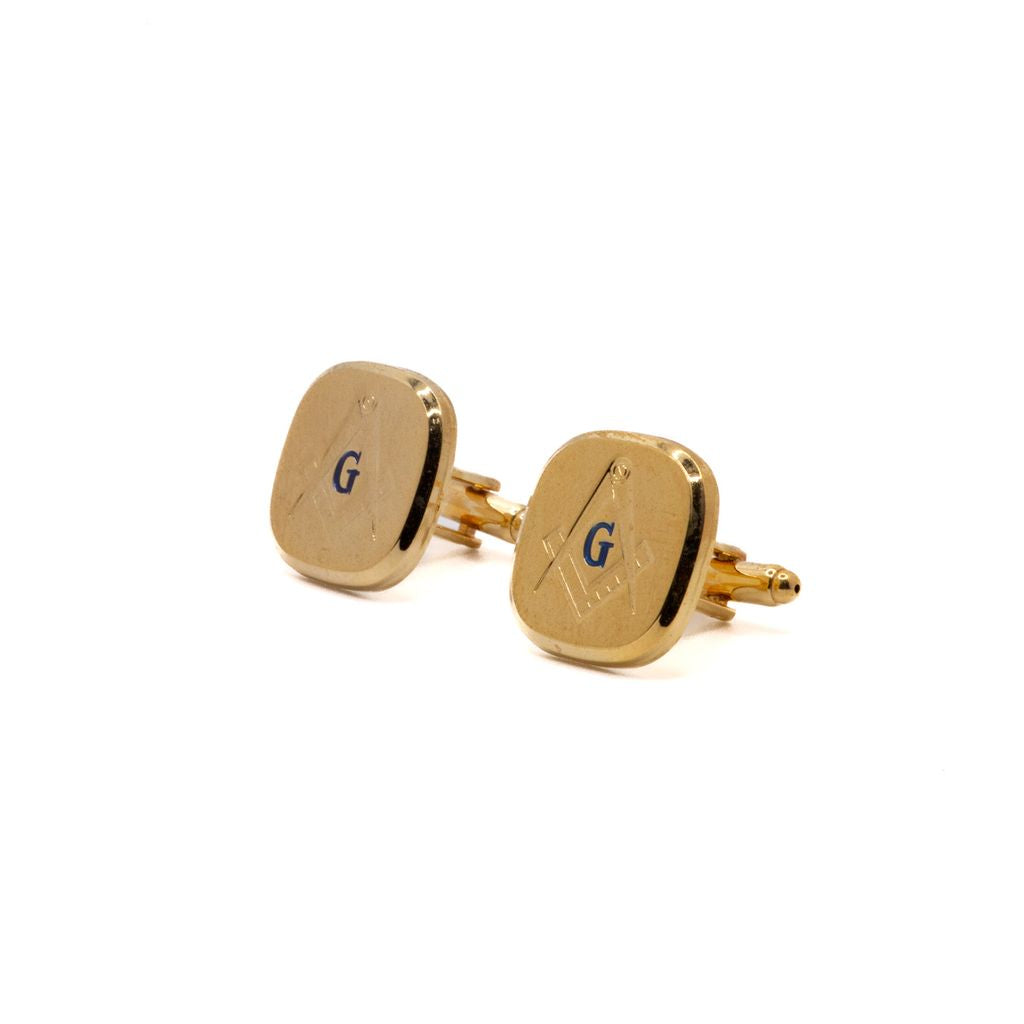 Gold Square and Compass cufflinks on a white background