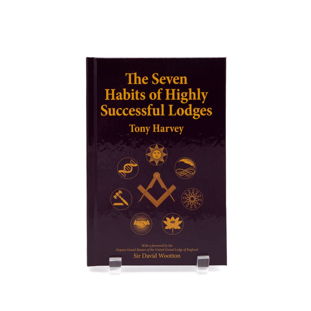 Book titled 'The Seven Habits of Highly Successful Lodges' by Tony Harvey on a white background