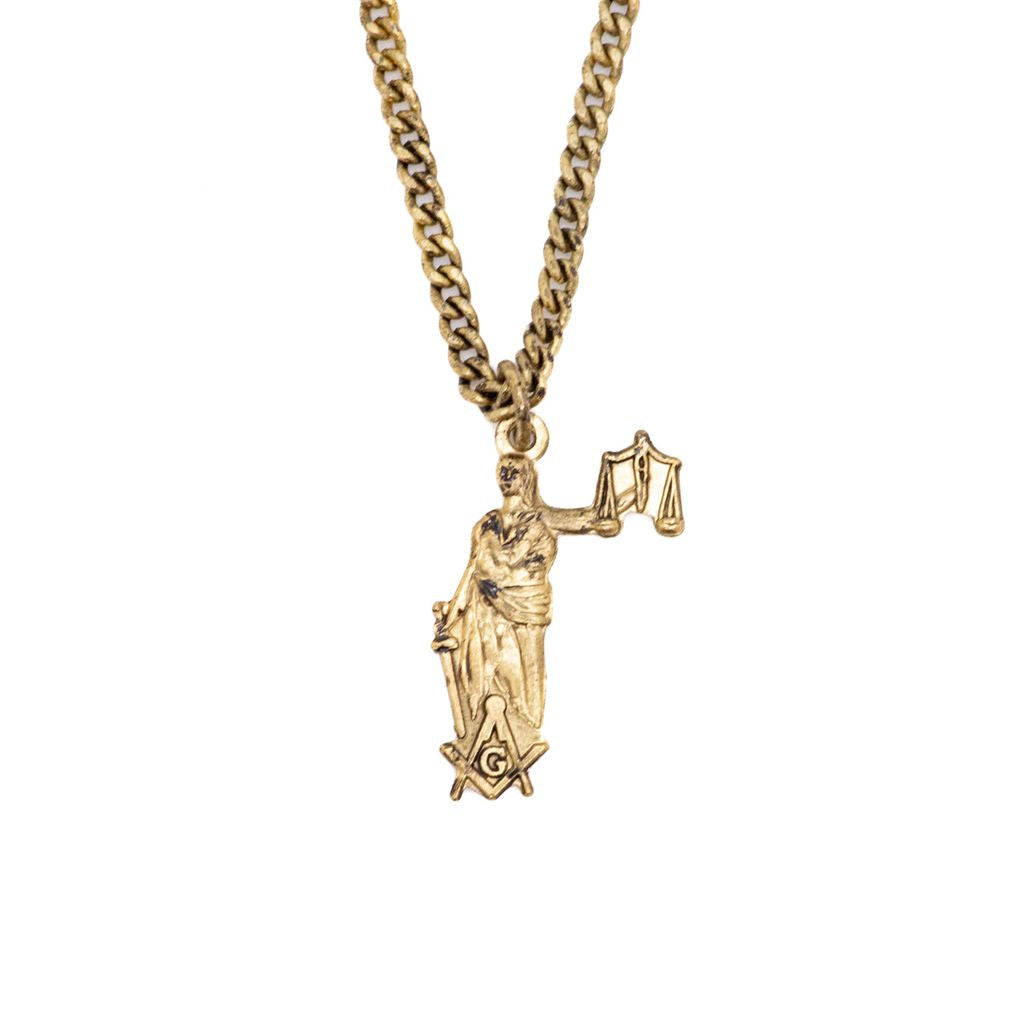 Gold necklace with a pendant of Lady Justice with a Square and Compass on a white background