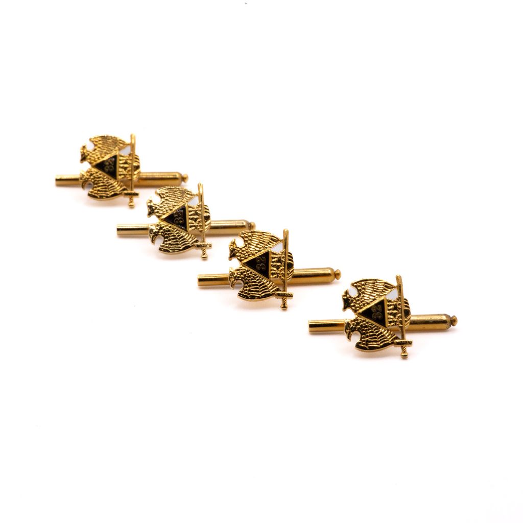 Set of gold cufflinks with two-headed eagle cutout on a white background