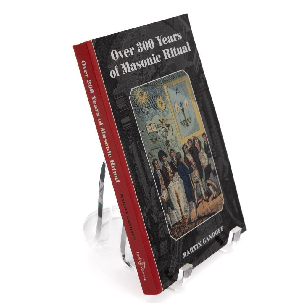Book titled 'Over 300 Years of Masonic Ritual' on a stand with a white background