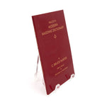Red book titled 'Macon's Modern Masonic Dictionary' by C. Bruce Hunter on a white background