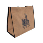 Brown tote bag with black piping and blue outline of the Masonic Temple. 
