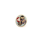 Round pin with multicolored masonic symbols on a white background