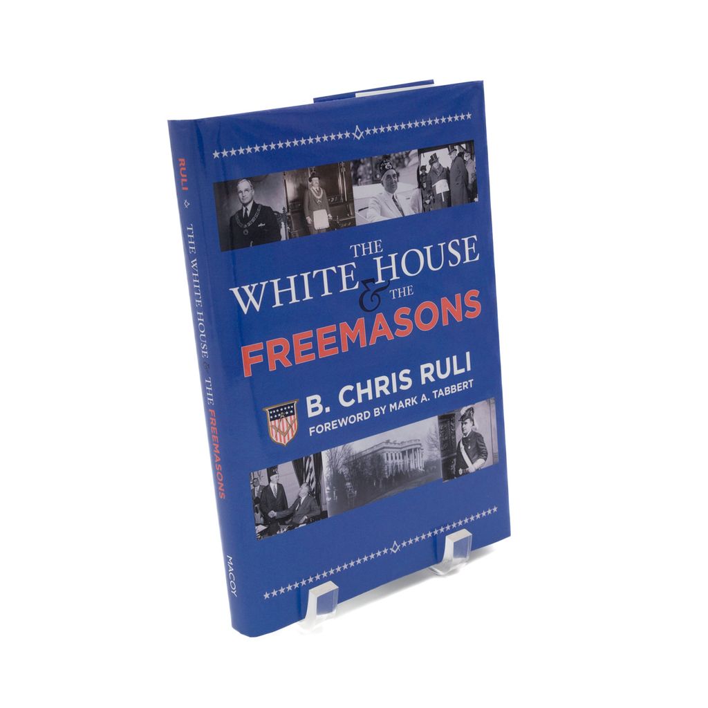 Book titled 'The White House and the Freemasons' by B. Chris Ruli on a white background