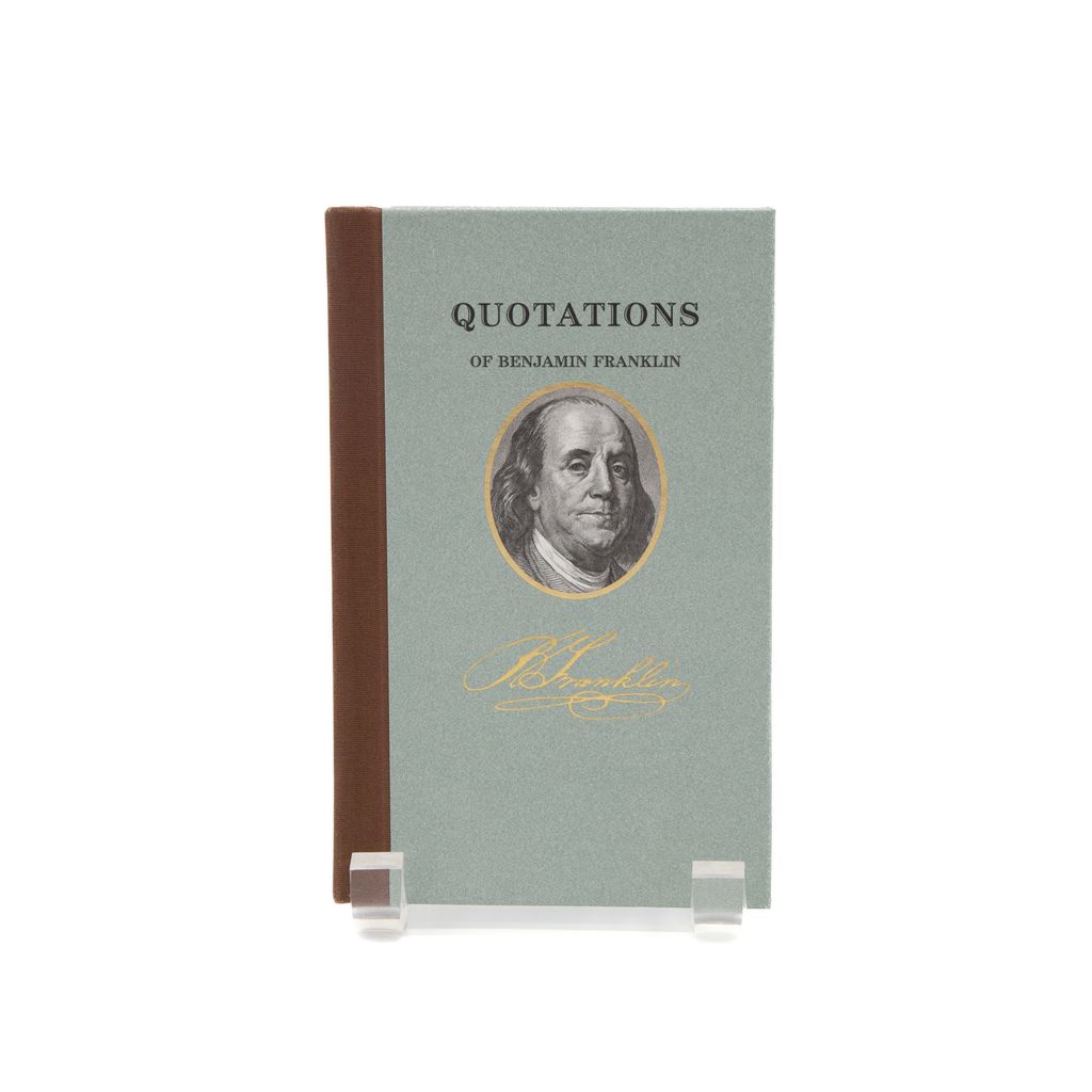 Book titled 'Quotations of Benjamin Franklin' with a portrait on the cover