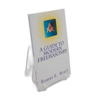 Book titled 'A Guide to Modern Freemasonry' by Robert E. Burtitt with a blue and gold Masonic symbol on the cover.