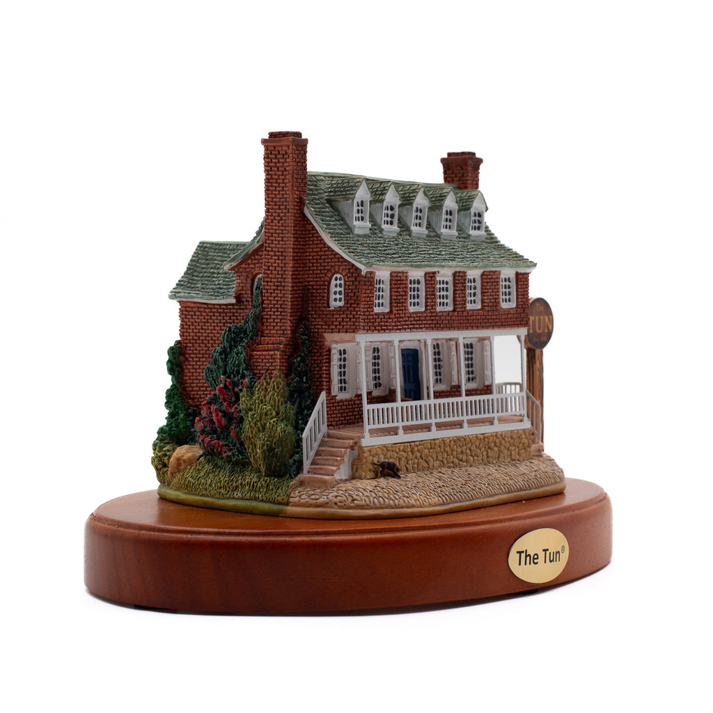 Miniature of the Tun Tavern, a brick building with fenced porch and metal tag reading "The Tun."
