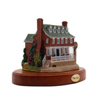 Miniature of the Tun Tavern, a brick building with fenced porch and metal tag reading "The Tun."
