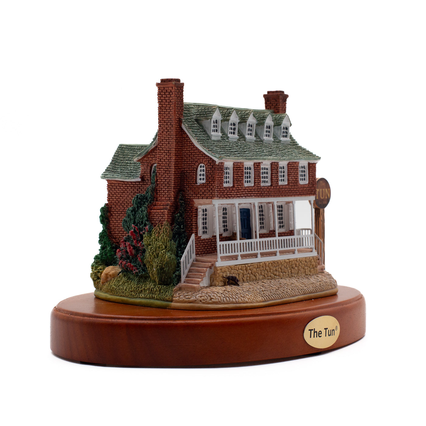 Miniature of the Tun Tavern, a brick building with fenced porch and metal tag reading "The Tun."