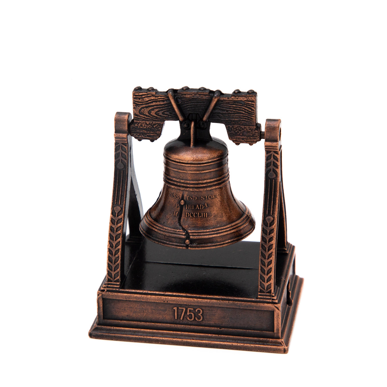 Bronze replica of the Liberty Bell on a stand with '1753' on a white background
