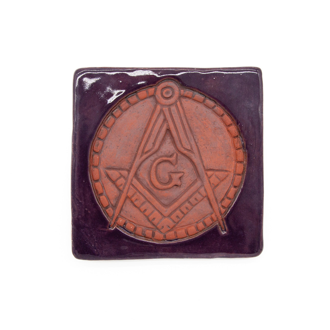 Square tile with a Square and Compass in clay with a purple border